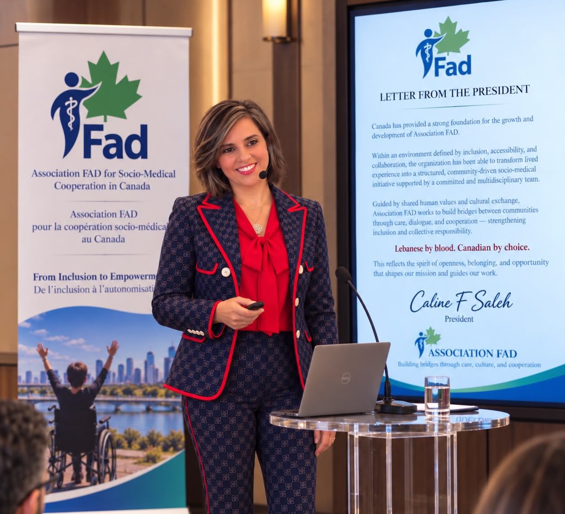 Caline Saleh, President of Association FAD, giving a presentation in front of the association’s banner.