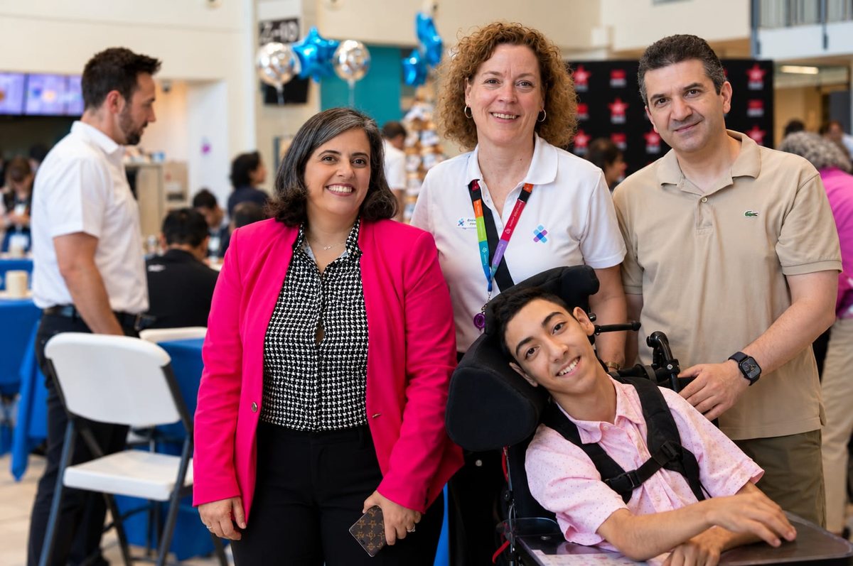 Caline Saleh with her son and two other people at the radiothon.